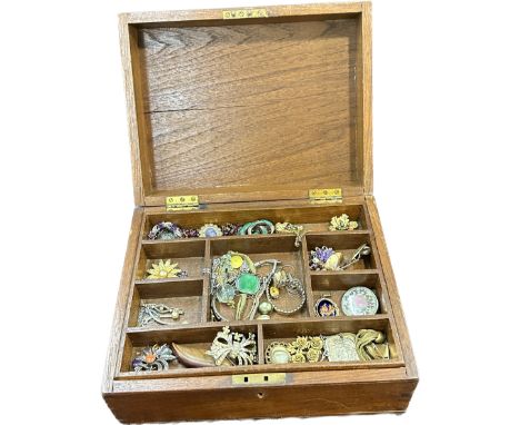 Wooden box containing vintage costume jewellery 