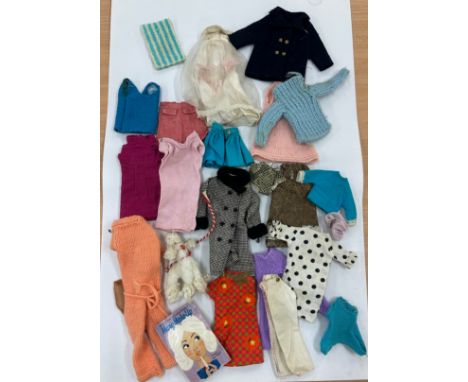 Selection of vintage dolls clothing to include Sindy 