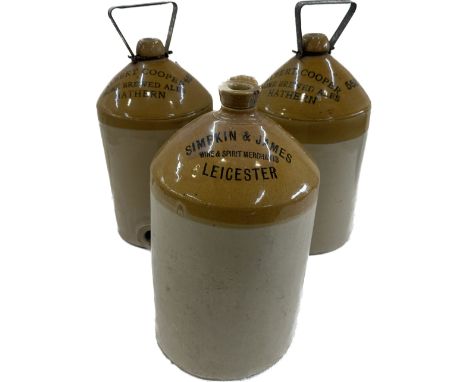 Three vintage stoneware jars tallest measures approximately 17 inches 