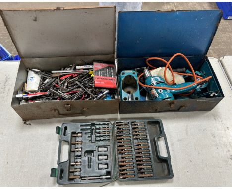 Three cased drill sets 