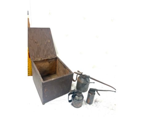 Vintage wooden tool box and a selection of oil cans 