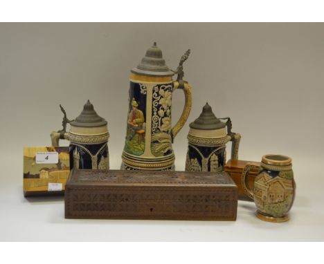 A carved softwood rectangular glove box;  other trinket boxes;  German Steins;  etc 