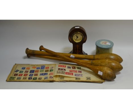 Ephemera - an Edwardian mahogany mantel clock; a schoolboy stamp collection; a set of juggling batons; a commemorative tin 