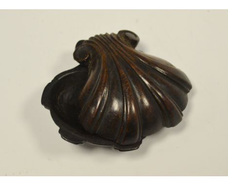 A 19th century mahogany shell shaped snuff box
