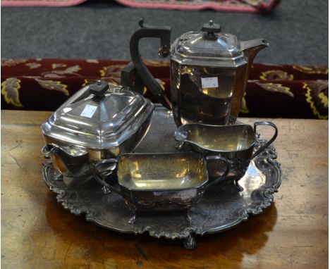 Plated Ware - an EPNS shaped circular ray, in the George III style, S-scroll border, knurl feet;   an EPNS canted four piece 