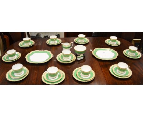 A Victorian  Crown Staffordshire part  tea service, apple green border , gilt edged