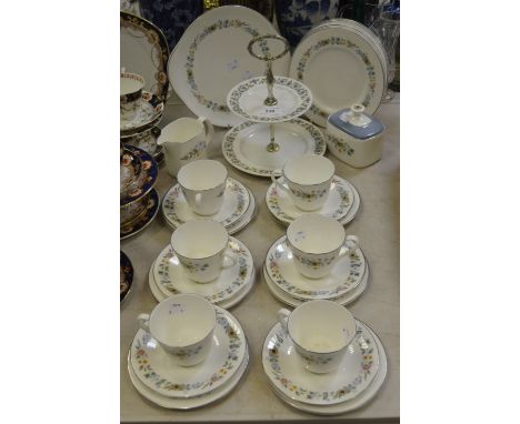 A Royal Doulton 'Pastorale' pattern tea service for six, including cups, saucers, side plates, cream jug, cake stand, sugar b