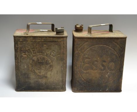 Advertisement - A two gallon Shell oil can; another Esso 