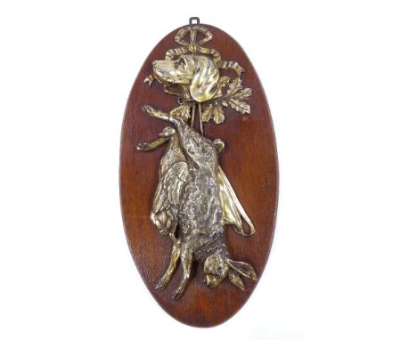 A relief cast electroplate hunting design wall plaque on oak mount, length 56cm Plating is lightly tarnished, but generally g