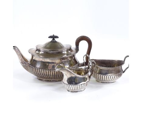 A Victorian 3-piece silver teaset, comprising teapot, cream jug and sugar bowl, half-fluted oval form with reeded edge, by Wi