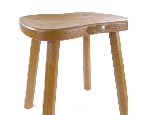 Robert Mouseman Thompson, golden oak stool on tapered octagonal legs, seat dimensions 36cm x 30cm, height 45cm Perfect condit