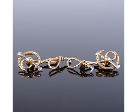 A pair of unmarked gold hunting cufflinks, riding crop, hunting horn and horseshoe panels, crop length 16.2mm, 5.8g Very good
