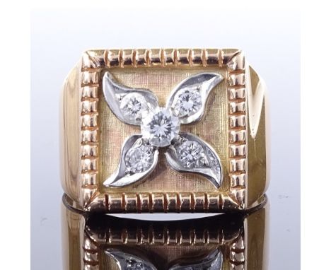 A 14ct gold diamond panel signet ring, central diamond set floral panel, total diamond content approx 0.4ct, setting height 1