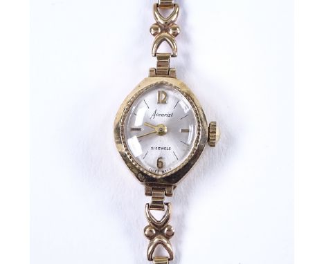 ACCURIST - a lady's 9ct gold mechanical wristwatch, silvered dial with Arabic and baton hour markers, 21 jewel movement with 