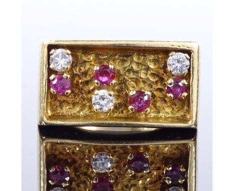 A 1970s 18ct gold ruby and diamond panel ring, textured finish, maker's marks H&amp;M, hallmarks London 1971, setting height 