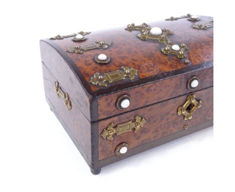 A 19th century French amboyna dome-top jewel box, with brass mounts and inset milk glass jewels, length 20cm Four of the glas