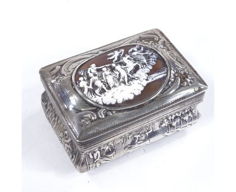 An Antique Dutch silver rectangular table snuffbox, with inset relief carved cameo panel, embossed hunting scene border and f