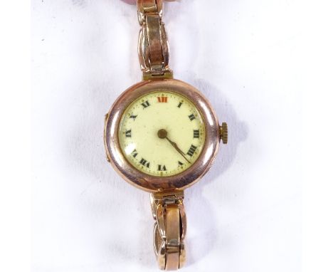 ROLEX - a lady's Vintage 9ct gold cased mechanical wristwatch, white enamel dial with Roman numeral hour markers and 9ct expa
