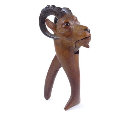 A Tyrolean carved wood ibex design nutcracker with glass eyes, length 21cm Perfect condition, no chips or cracks
