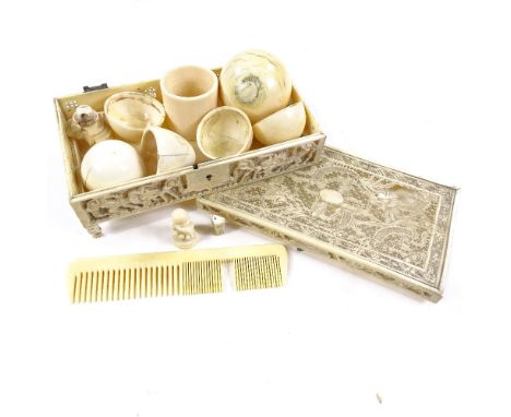 A group of ivory items, including a Cantonese carved and pierced fretwork dragon design box, length 18cm, an ivory billiard b