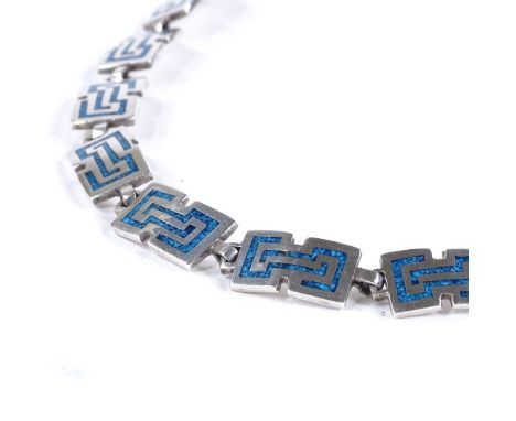 A Mexican sterling silver and turquoise enamel Aztec necklace, maker's marks SM, possibly Serafin Moctezuma, necklace length 