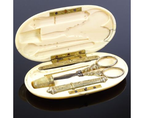 A Victorian ivory sewing etui, the interior fitted with silver-gilt accoutrements, length 11cm Lid has several very minor cra