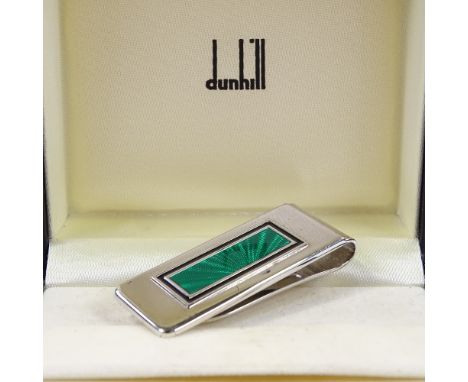 DUNHILL - a sterling silver and enamel money clip, engine turned green enamel sunburst panel with black border, length 4.5cm,