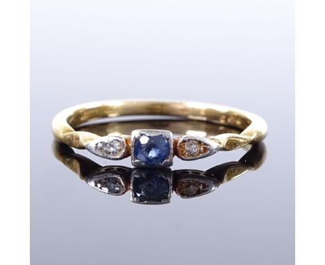 An 18ct gold 3-stone sapphire and diamond ring, pierced bridge and bevelled shoulders, maker's marks SU, setting height 3.7mm