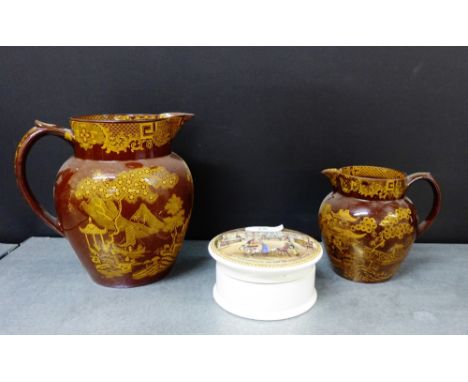 A set of two graduating brown glazed Scottish pottery jugs, each with Chinoiserie pattern, tallest 17cm, together with cerami