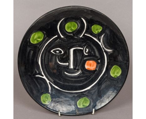 PABLO PICASSO (1881-1973) SpanishLimited edition Madoura Visage Noir ceramic plateThe underside stamped Madoura Piein feu Edi
