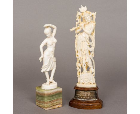 A late 19th/early 20th century Indian carved ivory model of Krishna Typically modelled playing the flute, mounted on a later 