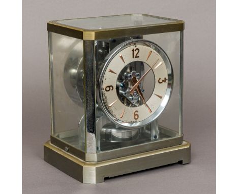 A chromed cased Jaeger leCoultre Atmos clockOf typical form, the silvered dial with Arabic numerals and batons.  23.5 cm high
