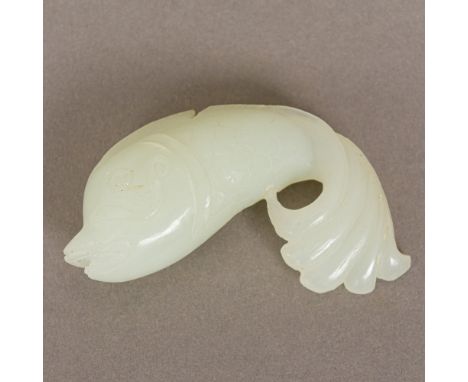 A Chinese carved celadon jade fishNaturalistically modelled.  8 cm long.  CONDITION REPORTS: Generally in good condition, som