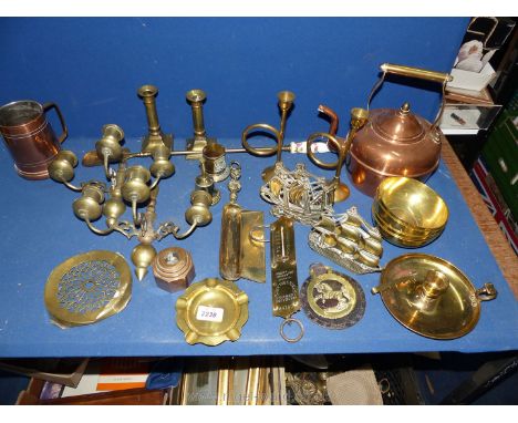 A quantity of brass and copper including teapot, ship bookends, dishes, scales etc.