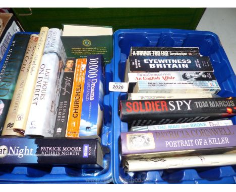 Two blue tubs of books including Churchill, Last Hours on Everest, Soldier Spy, The man who broke into Auschwitz, etc.
