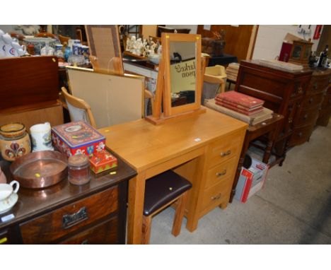 A modern light oak three drawer dressing table with matching mirror and stool 