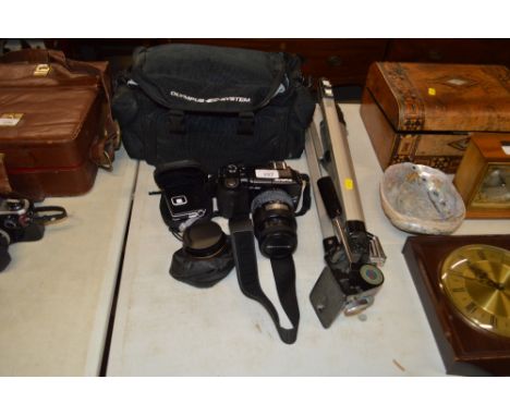 An Olympus E-300 camera with tripod stand, carrying bag etc. 