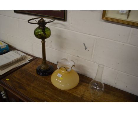 A brass Corinthian columned oil lamp and shade AF