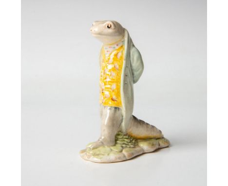 Modeled in a soft green coat, yellow waistcoat with tan markings and grey trousers. Beswick Beatrix Potter backstamp. Artist: