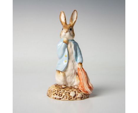 Modeled in a soft blue jacket with yellow buttons, holding a red handkerchief. Royal Albert backstamp. Artist: Martyn AlcockI