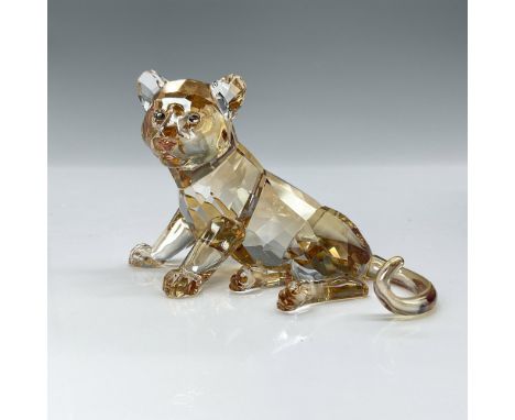Shimmers in fully faceted golden shine crystal with satin crystal stripes. Swarovski backstamp. Item comes with original box 