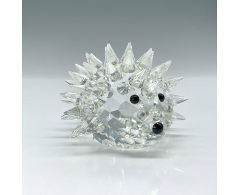 Part of the Silver Crystal Collection. Lead crystal. Multifaceted, in clear coloration with black eyes and nose. Swarovski ac