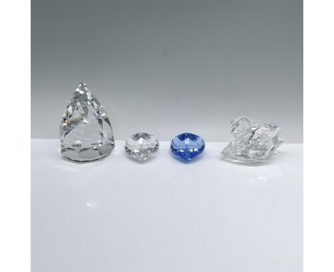 A set of 4 that includes a crystal swan (010005) gliding gracefully, alongside a captivating blue heart (210899), a pristine 