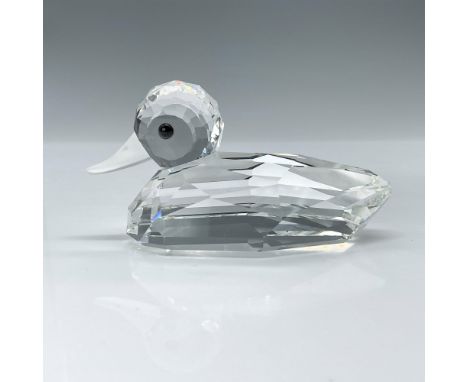 This rare duck features a faceted clear crystal body with frosted bill and thoughtful black eyes. Swarovski etched backstamp.