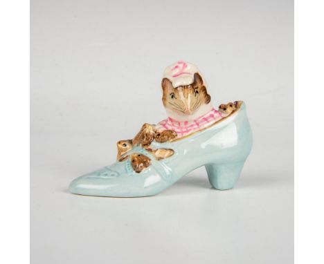 Mother mouse and her children residing in a high-heel, light blue shoe. This item has its original box measuring 3"L x 3"W x 