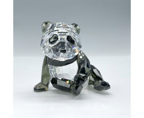 A clear and black crystal figure of a young panda bear. Swarovski backstamp. This item has its original box which measures 5"