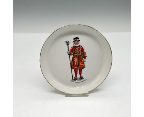 White porcelain dish with gilt edge with decorated center of Chief Yeoman. RWL London backstamp. Issued: 20th centuryDimensio