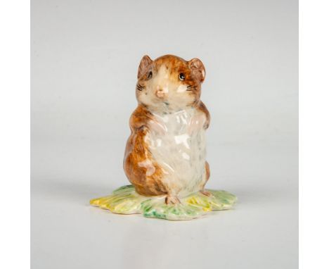 Glossy brown and white figure is standing on a green leaf. Beswick backstamp. This item has its original box. Box measures: 3