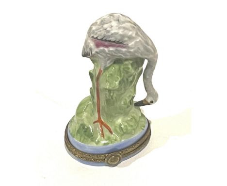 Realistic hinged mini box boasts an elegant gray flamingo with hints of pink on green aquatic plant sitting in blue water. Gi