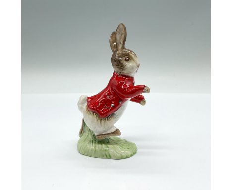 Hand painted colorway modeled as the loveable Beatrix Potter character, Peter Rabbit. A brown and white rabbit in a red coat 